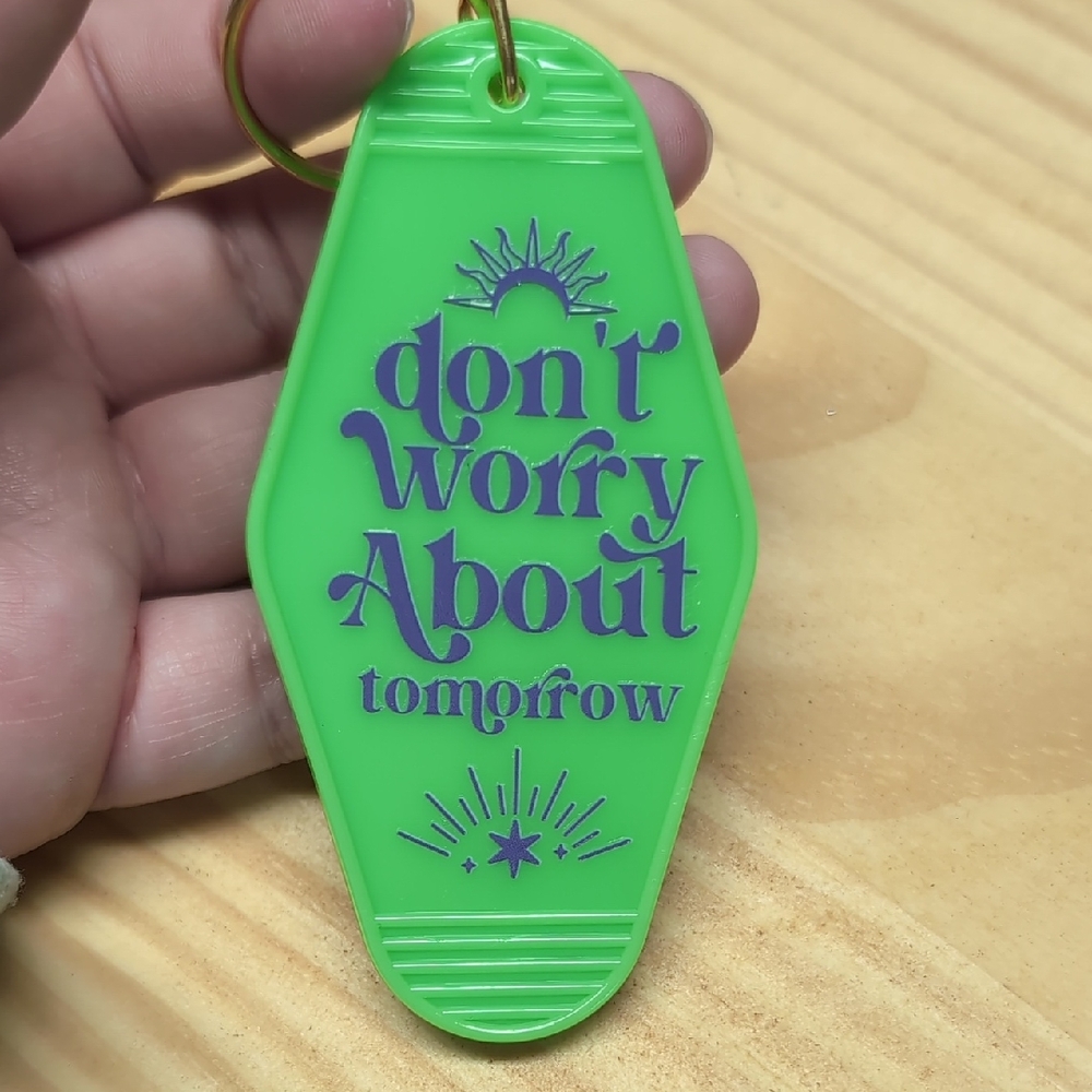 Don't Worry About Tomorrow Green Keychain With Purple Writing